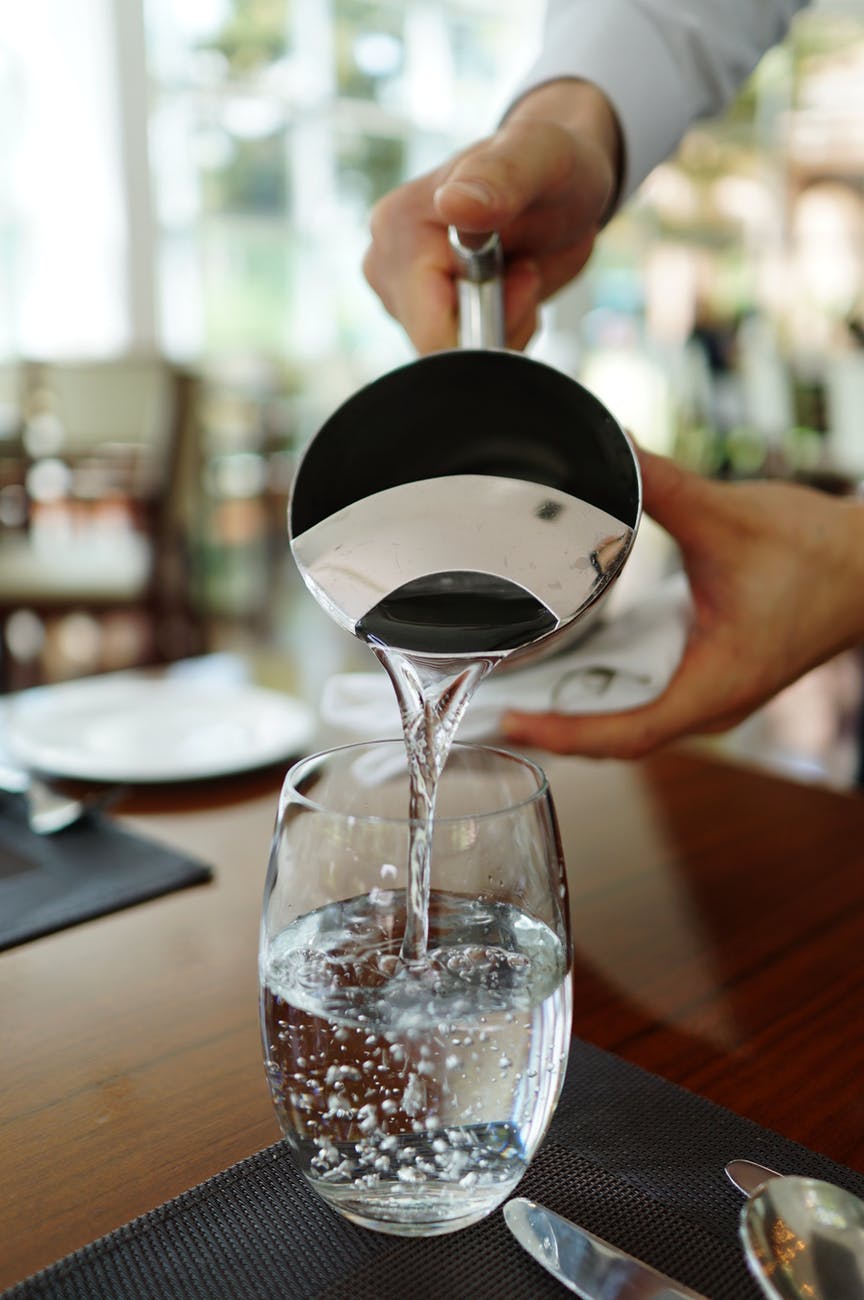 waiter pouring water
